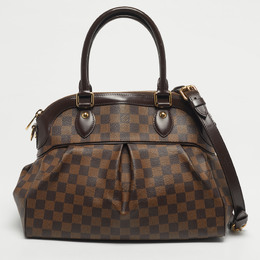 Louis Vuitton: Коричневая сумка 