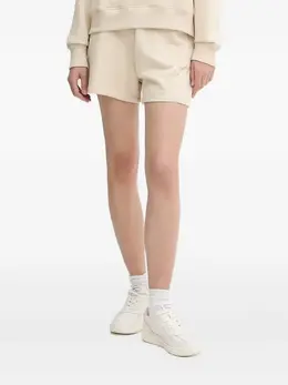 Armani Exchange: Бежевые шорты 
