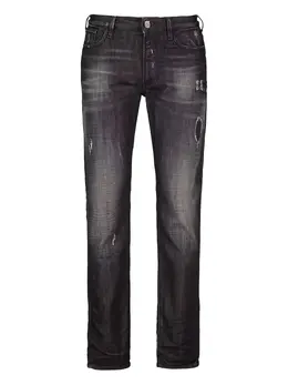 Emporio Armani: Рваные джинсы 