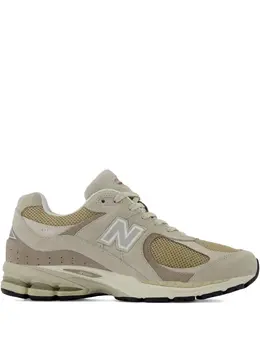 New Balance: Бежевые кроссовки  2002R