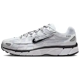 NIKE: Серебристые кеды 