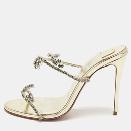 Christian Louboutin: Золотые сандалии 