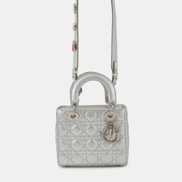 Dior: Серебристая сумка 