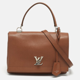 Louis Vuitton: Коричневая сумка 