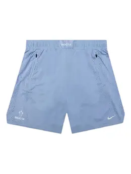 Nike: Светлые шорты 