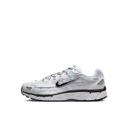 NIKE: Серебристые кеды 