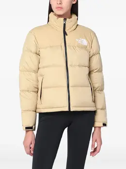The North Face: Светлая куртка  Nuptse