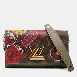 Louis Vuitton: Коричневый кошелёк  Twist