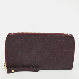 Louis Vuitton: Фиолетовый кошелёк  Zippy