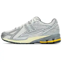 New Balance: Серые кеды  1906R