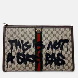 Gucci: Бежевый клатч 
