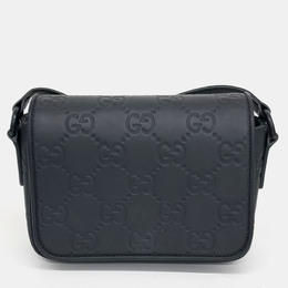 Gucci: Чёрная сумка  GG