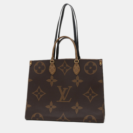 Louis Vuitton: Коричневая сумка-шоппер 