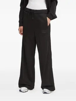 Ea7 Emporio Armani: Чёрные брюки 