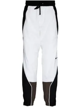 Nike: Белые брюки 