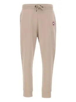 Canada Goose: Бежевые брюки 