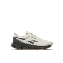 Reebok: Бежевые кроссовки  Zig