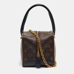 Louis Vuitton: Коричневая сумка 