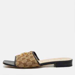 Gucci: Бежевые сандалии  GG