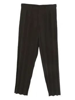 Homme Plissé Issey Miyake: Тёмные брюки 