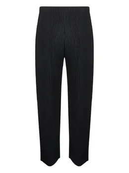 Homme Plissé Issey Miyake: Чёрные брюки 