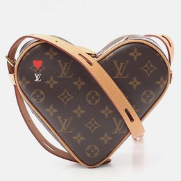 Louis Vuitton: Коричневая сумка 
