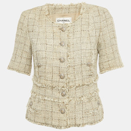 Chanel: Бежевая куртка 
