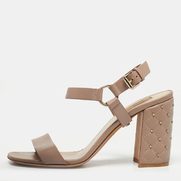Valentino: Бежевые сандалии  Rockstud