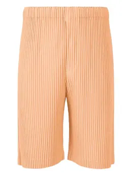 Homme Plissé Issey Miyake: Оранжевые брюки 