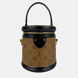 Louis Vuitton: Коричневая сумка 
