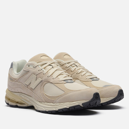 New Balance: Бежевые кроссовки 