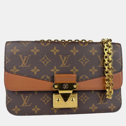 Louis Vuitton: Коричневая сумка 