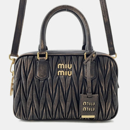 Miu Miu: Коричневая сумка 