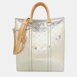Louis Vuitton: Серебристая сумка 