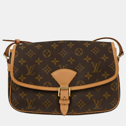 Louis Vuitton: Коричневая сумка 