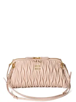 Miu Miu: Розовый клатч 