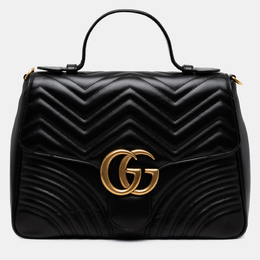 Gucci: Чёрная сумка  GG Marmont