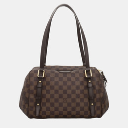 Louis Vuitton: Коричневая сумка 