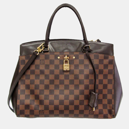 Louis Vuitton: Коричневая сумка 