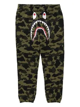 A BATHING APE®: Зелёные брюки 