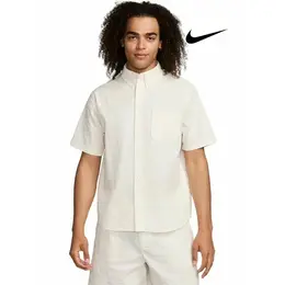 NIKE: Бежевая рубашка 