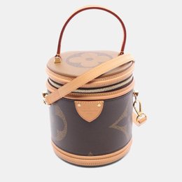 Louis Vuitton: Коричневая сумка 