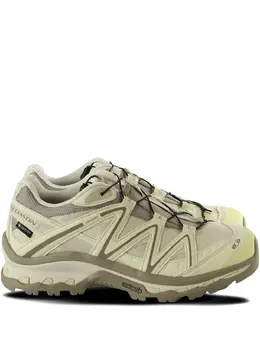 Salomon: Зелёные кроссовки 