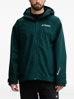 adidas: Зелёная куртка 