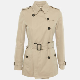 Burberry: Бежевый плащ 